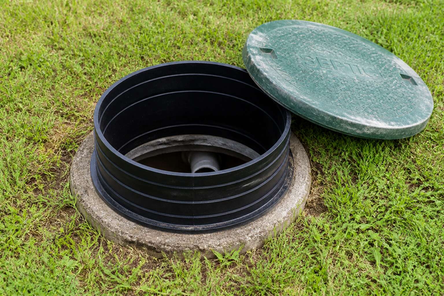 are septic tank risers required